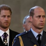 Article thumbnail: FILE PHOTO: Britain's William, Prince of Wales, and Prince Harry react as the coffin of Britain's Queen Elizabeth arrives at Westminster Hall from Buckingham Palace for her lying in state, in London, Britain, September 14, 2022. REUTERS/Alkis Konstantinidis/Pool/File Photo