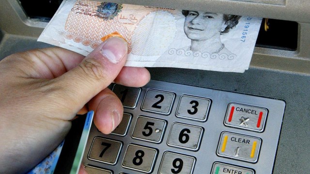 Article thumbnail: File photo dated 06/04/06 of a person using a cashpoint. Nine new banking hubs have been recommended by ATM network Link, under an initiative to help maintain the cash network. Banking hubs are a shared banking space on the high street, with dedicated rooms where customers can see community bankers from their own bank. Issue date: Friday January 27, 2023. PA Photo. The community bankers work on rotation, with a different banking provider available on each day of the week. See PA story MONEY Cash. Photo credit should read: Gareth Fuller/PA Wire