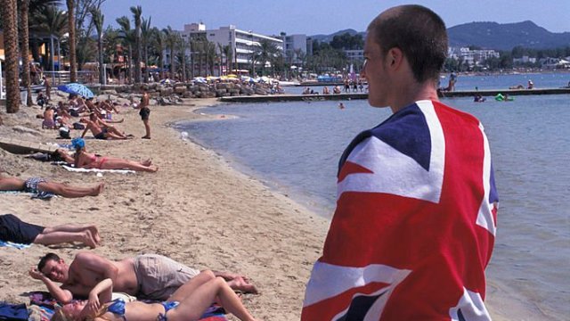 Article thumbnail: [UNVERIFIED CONTENT] British holidaymaker wrapped in Union Jack flag towel on the beach in San Antonio, Ibiza