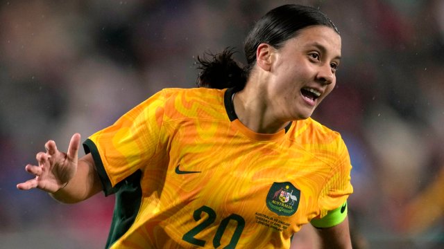 Article thumbnail: FILE - Australia's Sam Kerr celebrates after scoring against England during the women's international friendly soccer match between England and Australia at the Gtech Community Stadium in London, England, Tuesday, April 11, 2023. (AP Photo/Kin Cheung, File)