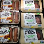 Article thumbnail: FILE - Packages of Beyond Meat's Beyond Burgers and Beyond Sausage, are shown in this photo, in New York, Thursday, April 29, 2021. (AP Photo/Richard Drew, File)