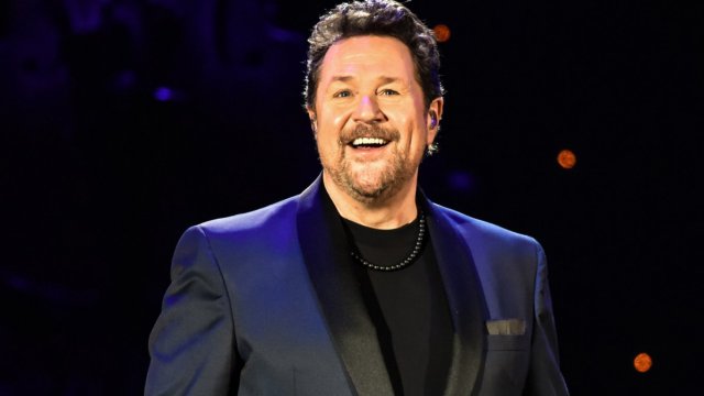 Article thumbnail: LONDON, ENGLAND - MARCH 17: Michael Ball performs at Eventim Apollo on March 17, 2024 in London, England. (Photo by Robin Little/Redferns)