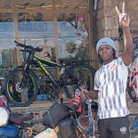 Article thumbnail: Karim Kabore who is cycling through every country in Africa Image via writer Charles Pensulo