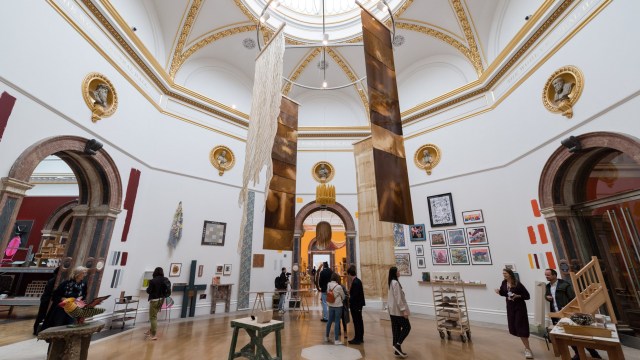 Article thumbnail: LONDON, UNITED KINGDOM - JUNE 11, 2024: Visitors view artworks during a photocall for the 256th Summer Exhibition at the Royal Academy of Arts in London, United Kingdom on June 11, 2024. The Summer Exhibition is the world's largest open submission contemporary art show and this year's theme is 'making space'. (Photo credit should read Wiktor Szymanowicz/Future Publishing via Getty Images)