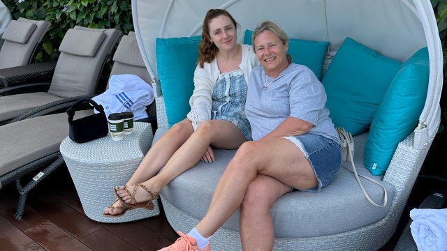 Article thumbnail: Amy with her mother at Marina Bay Sands in Singapore (Photo: Supplied)