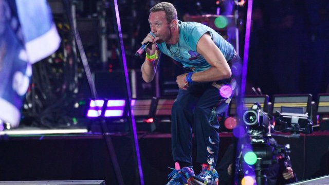 Article thumbnail: Chris Martin of Coldplay performs on the Pyramid stage (Photo: Jim Dyson/Redferns)