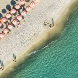 Article thumbnail: Around half of Italy's coastline is owned by private clubs (Photo: kamisoka via Getty Images)