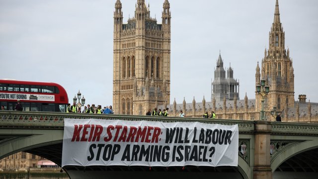 Article thumbnail: CORRECTION / A banner reading "Keir Starmer: Will Labour Stop Arming Israel?" is hung over the side of Westminster Bridge, in front of the Palace of Westminster, home to the Houses of Parliament, during early morning rush hour in London on June 3, 2024. Britain's Conservative Prime Minister Rishi Sunak and Labour opposition leader Keir Starmer will go head-to-head Tuesday, June 4, in the first televised debate of the election campaign, broadcaster ITV announced Wednesday, May 29. (Photo by HENRY NICHOLLS / AFP) / "The erroneous mention[s] appearing in the metadata of this photo by HENRY NICHOLLS has been modified in AFP systems in the following manner: Removing reference to Greenpeace, included in error. Please immediately remove the erroneous mention[s] from all your online services and delete it (them) from your servers. If you have been authorized by AFP to distribute it (them) to third parties, please ensure that the same actions are carried out by them. Failure to promptly comply with these instructions will entail liability on your part for any continued or post notification usage. Therefore we thank you very much for all your attention and prompt action. We are sorry for the inconvenience this notification may cause and remain at your disposal for any further information you may require." (Photo by HENRY NICHOLLS/AFP via Getty Images)