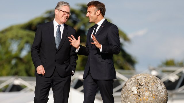 Article thumbnail: France's President Emmanuel Macron (R) talks to Britain's Prime Minister Keir Starmer (L) during a bilateral meeting on the sidelines of the Meeting of the European Political Community at the Blenheim Palace garden in Woodstock, near Oxford, on July 18, 2024. (Photo by Ludovic MARIN / AFP) (Photo by LUDOVIC MARIN/AFP via Getty Images) *** BESTPIX ***