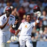 Article thumbnail: Cricket - Second Test - England v West Indies - Trent Bridge Cricket Ground, Nottingham, Britain - July 19, 2024 West Indies' Kavem Hodge celebrates after reaching his century with Jason Holder Action Images via Reuters/Andrew Boyers TPX IMAGES OF THE DAY