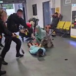 Article thumbnail: Policeman appears to stamp on mans head after tasering in violent scenes at Manchester Airport. Policeman appears to stamp on mans head after tasering in violent scenes. A GMP spokesperson said: ?Officers were called to reports of an altercation between members of the public in Terminal 2 at Manchester Airport. ?Whilst attempting to arrest one of the suspects of the earlier altercation, three officers were subject to a violent assault, where they were punched to the ground. A female officer suffered a broken nose and all three were taken to hospital for treatment. ?As the attending officers were firearms officers, there was a clear risk during this assault of their firearms being taken from them.