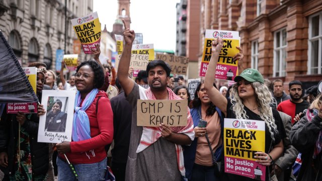 Protesters gather outside Andy Burnham’s office after man kicked in head