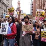 Article thumbnail: A Stand Up To Racism demonstration in Manchester after a police officer was suspended after a video which appeared to show a man being kicked as he lay on the floor. Footage shared on social media, said to have been filmed at Manchester Airport's terminal two on Tuesday, appeared to show a Greater Manchester Police (GMP) officer kick and stamp on the head of a man who was lying face down on the floor. Picture date: Thursday July 25, 2024. PA Photo. See PA story POLICE Airport. Photo credit should read: James Speakman/PA Wire