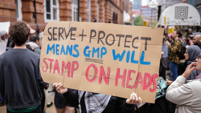 Article thumbnail: A Stand Up To Racism demonstration in Manchester after a police officer was suspended after a video which appeared to show a man being kicked as he lay on the floor (Photo: James Speakman/PA Wire)